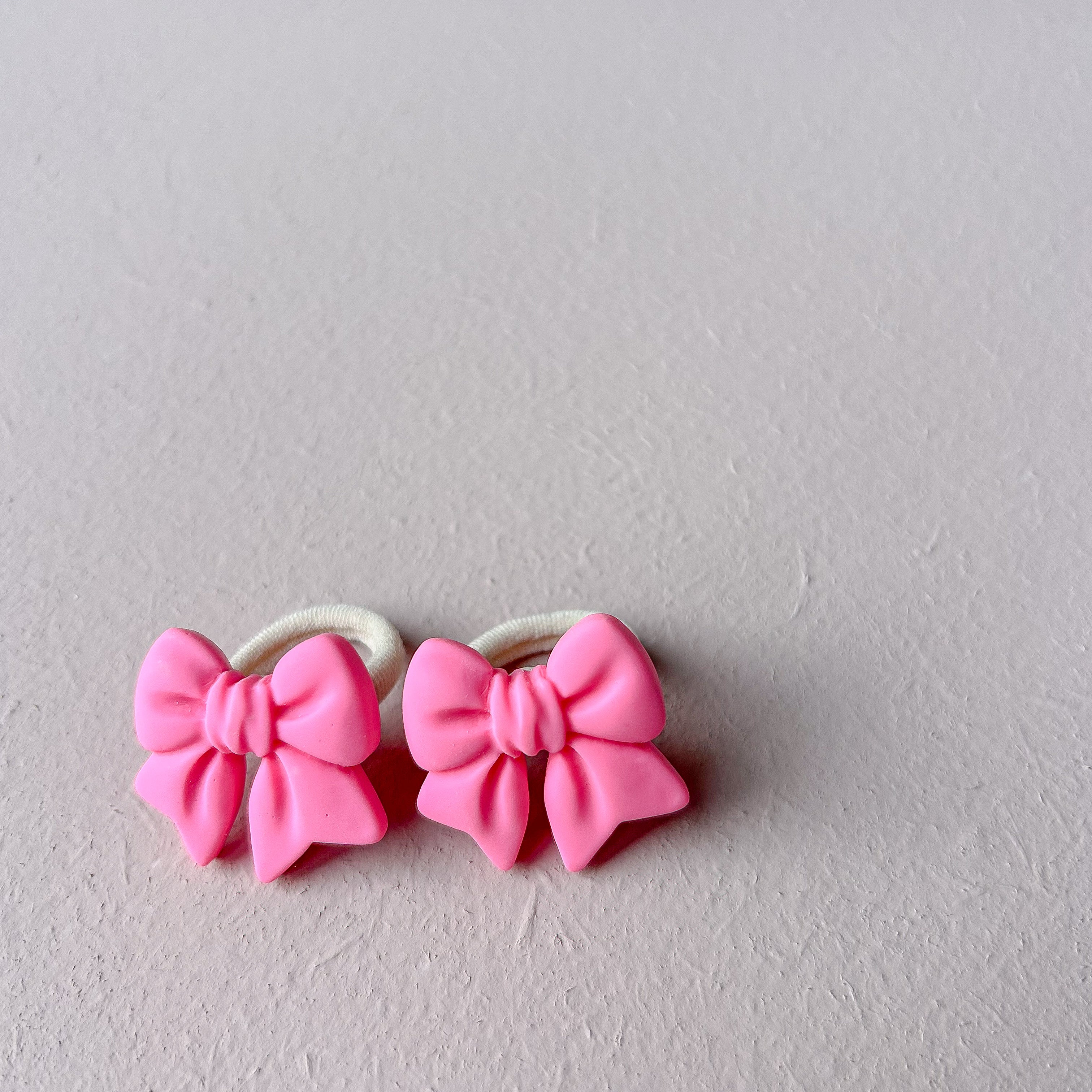 Haarelastiekjes- Strikjes donker roze